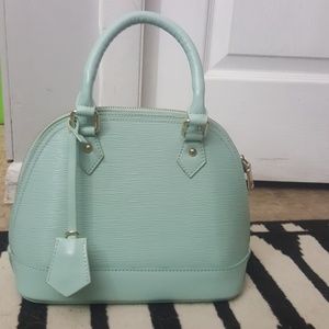 Blue green purse